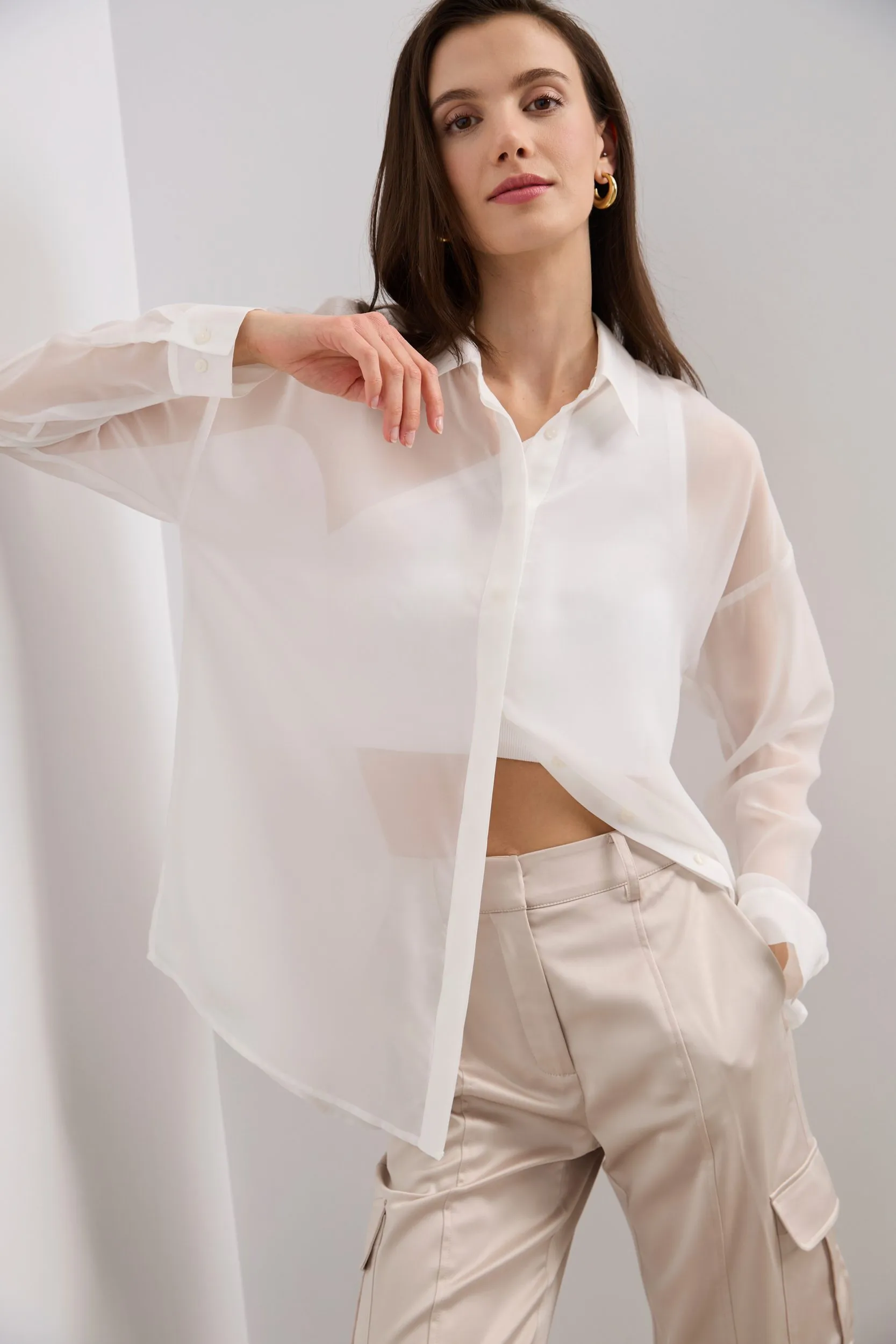 Sheer oversized blouse with open back sold by Tristan Style