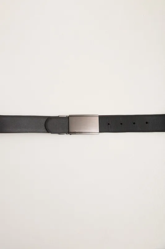 Plate buckle reversible leather belt sold by Tristan Style