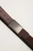 Plate buckle reversible leather belt sold by Tristan Style