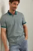 Graphic print polo sold by Tristan Style