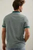 Graphic print polo sold by Tristan Style