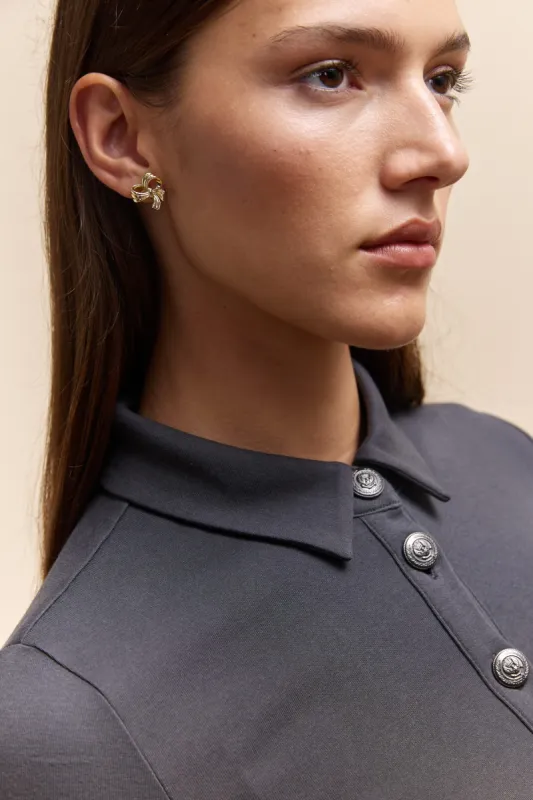 Bow earring sold by Tristan Style