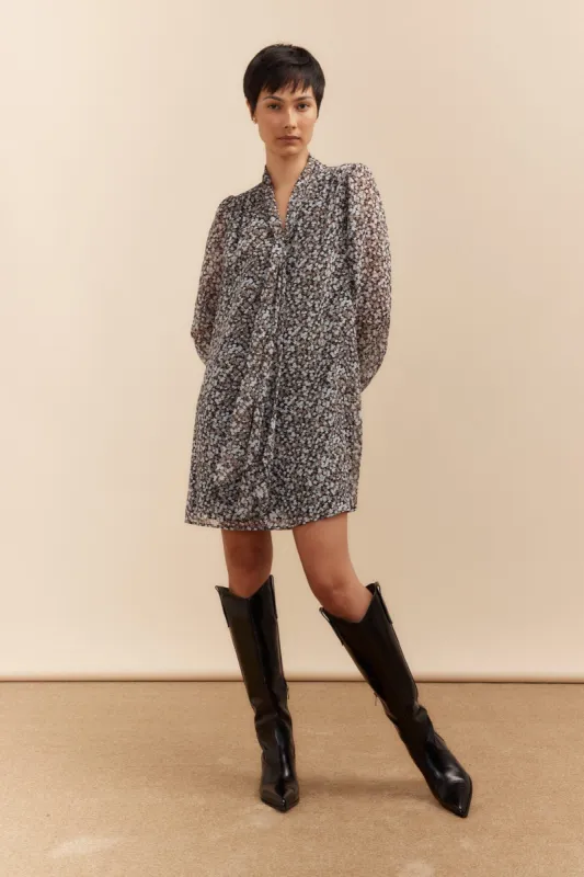 A line dress with tied front sold by Tristan Style