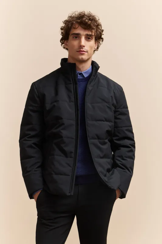 Quilted coat with zip closure sold by Tristan Style