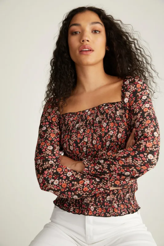 Floral printed blouse with ruched body sold by Tristan Style