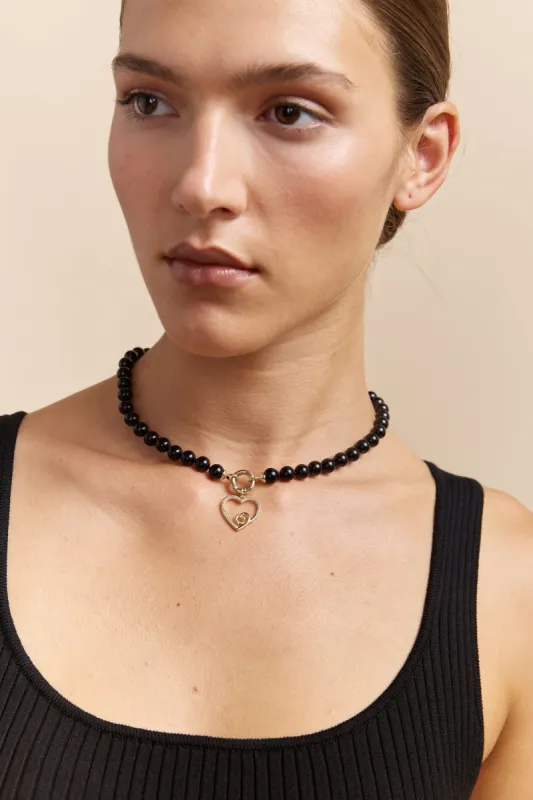 Pearl necklace with charm sold by Tristan Style