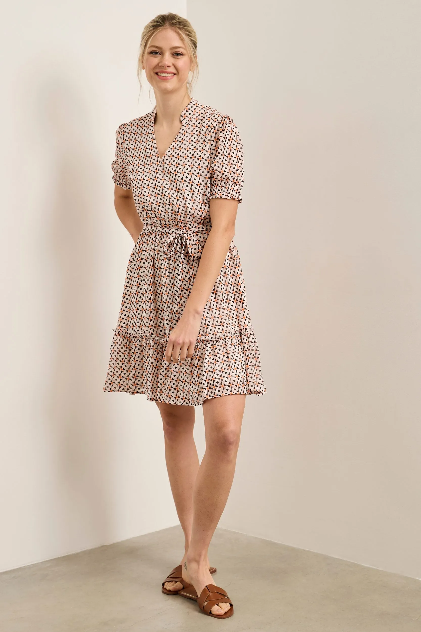 Fluid dress with ruching details sold by Tristan Style