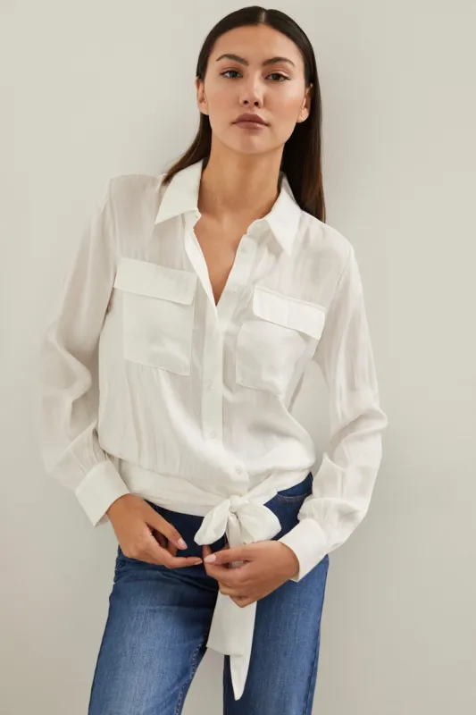 Blouse with tied hem sold by Tristan Style