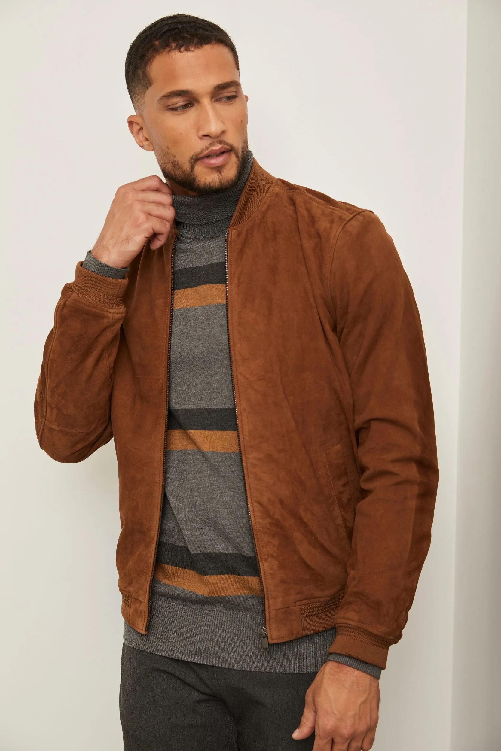Ribbed collar Suede bomber jacket sold by Tristan Style