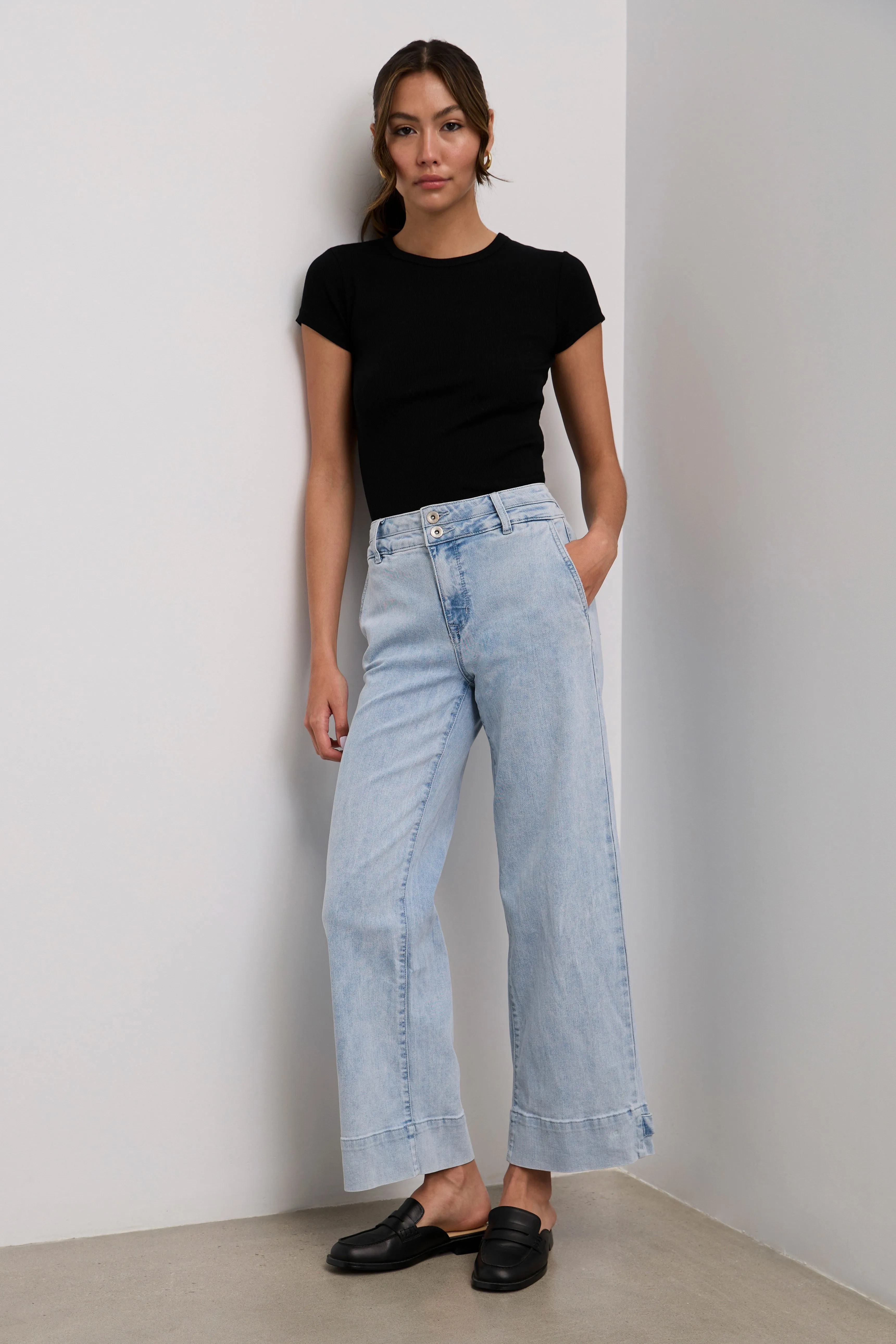 High waisted jeans with button detail sold by Tristan Style