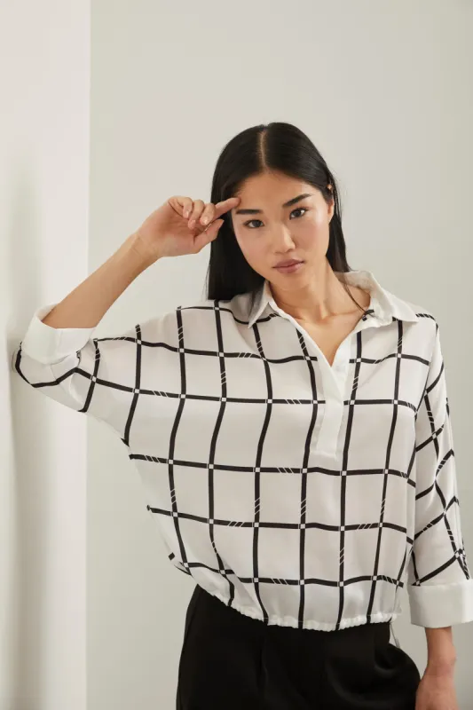 Printed dolman shirt with drawstring sold by Tristan Style