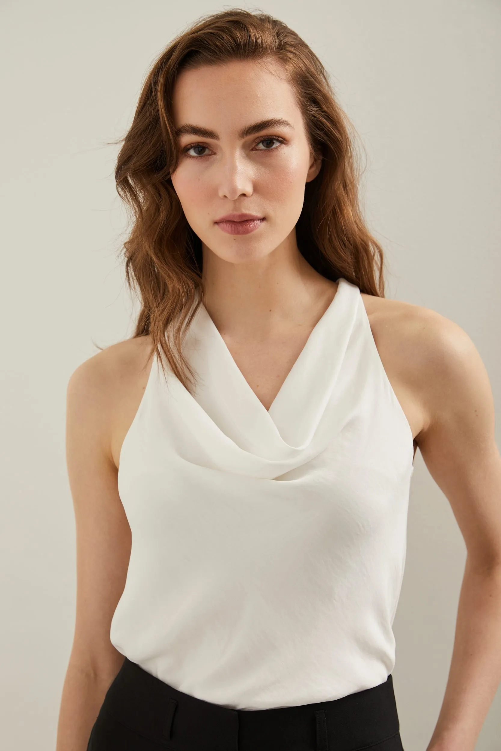 Sleeveless top with draped col sold by Tristan Style