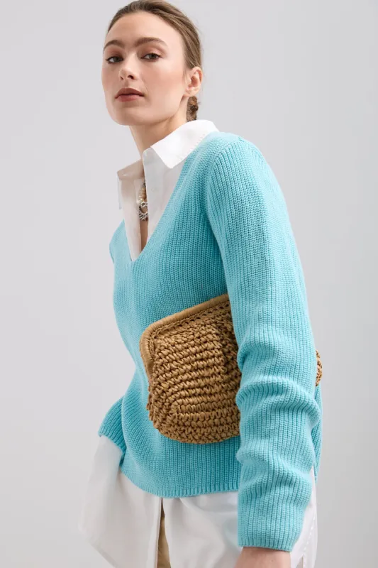 Raffia pouch bag sold by Tristan Style