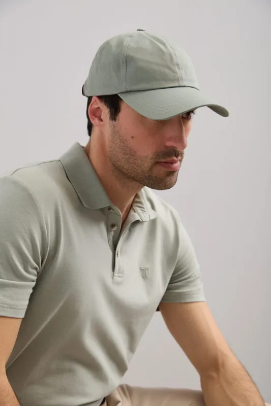 Twill fabric baseball cap with leather band sold by Tristan Style