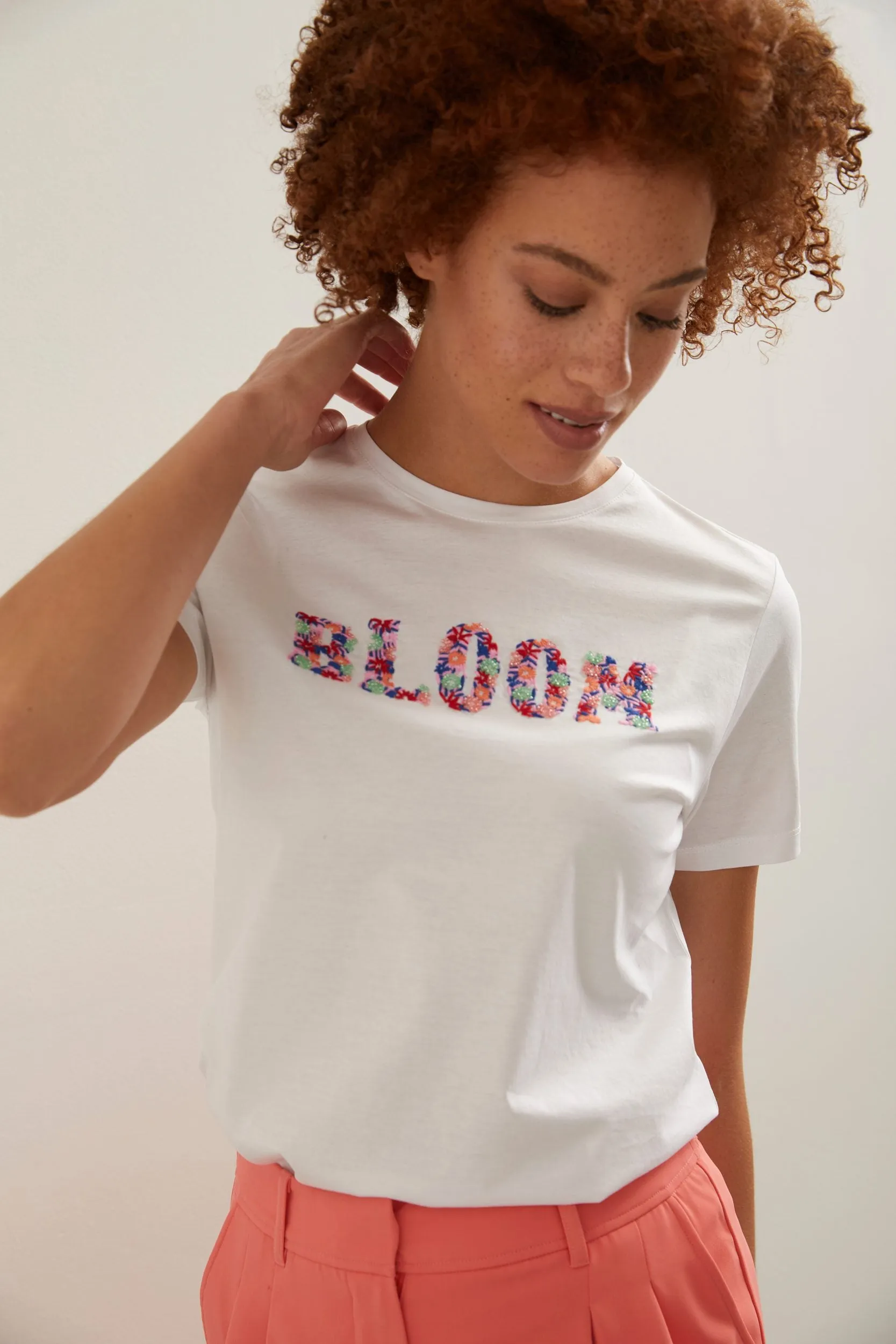 BLOOM embellished T-shirt sold by Tristan Style