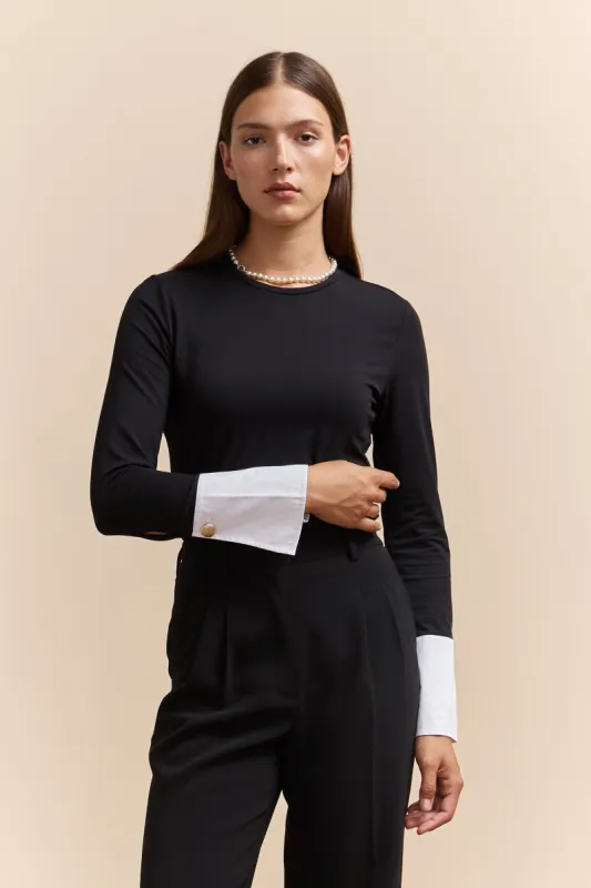 Multi fabrics top with buttoned cuff sold by Tristan Style