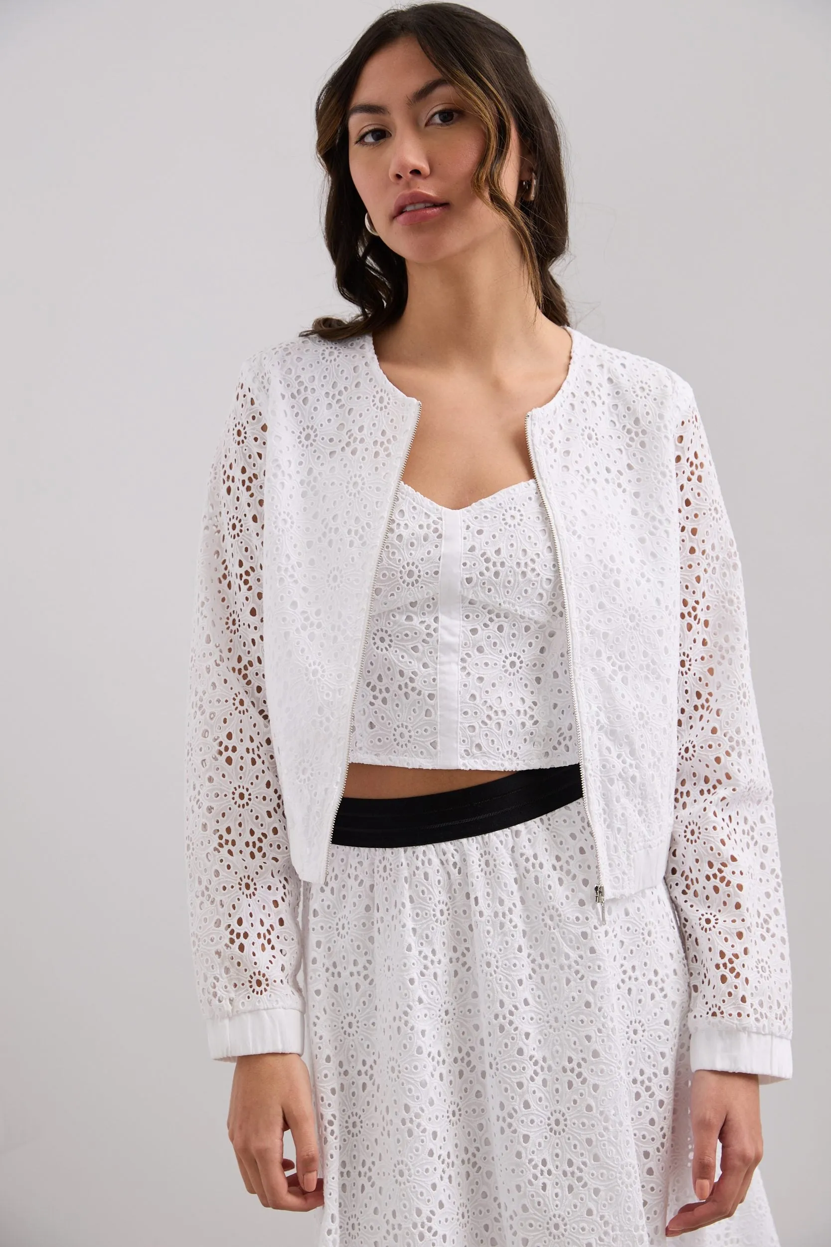Broderie anglaise bomber jacket sold by Tristan Style
