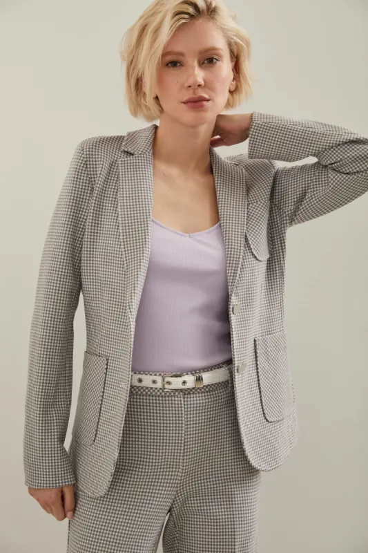 Fitted stretch blazer with applied pockets sold by Tristan Style