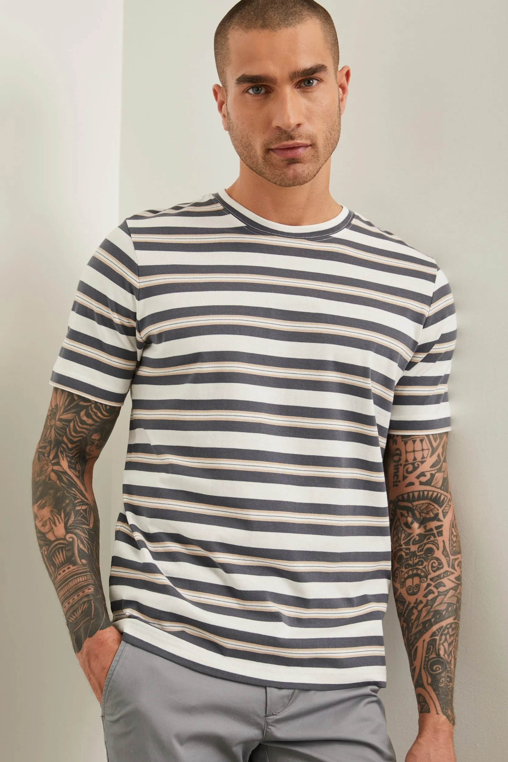 Striped crew neck t-shirt sold by Tristan Style