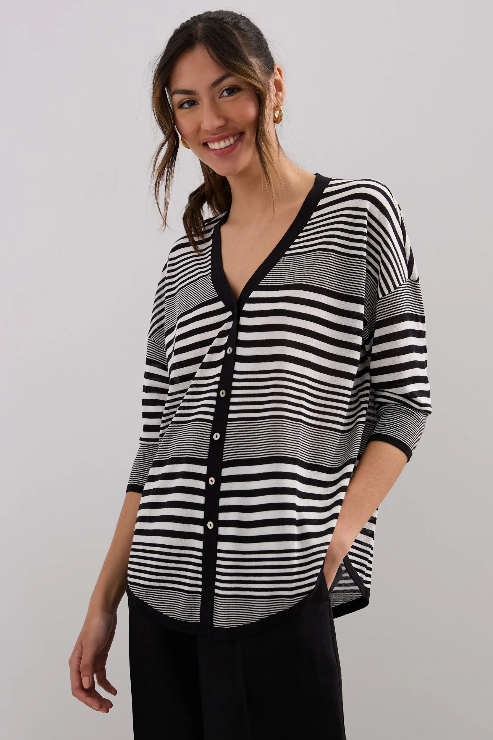 Striped loose cardigan sold by Tristan Style