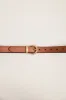 Classic belt with round buckle sold by Tristan Style