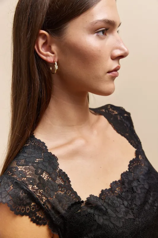 Hoop earring with knot sold by Tristan Style