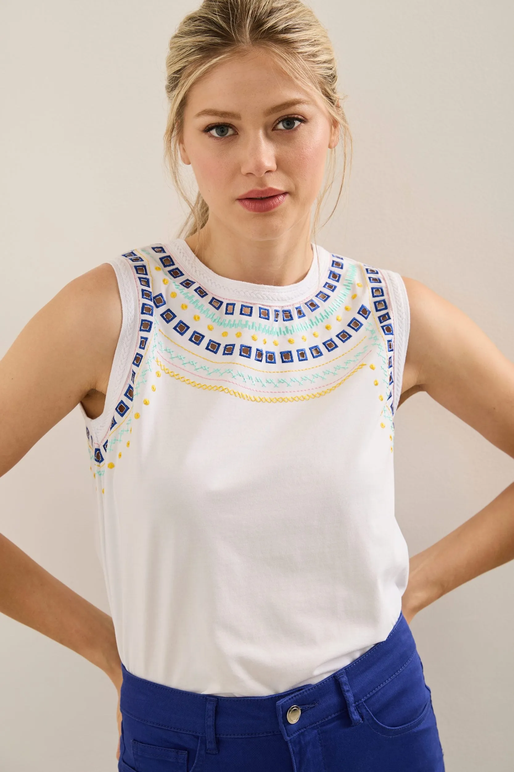 Sleeveless top with embroidered neckline sold by Tristan Style