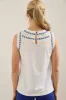 Sleeveless top with embroidered neckline sold by Tristan Style