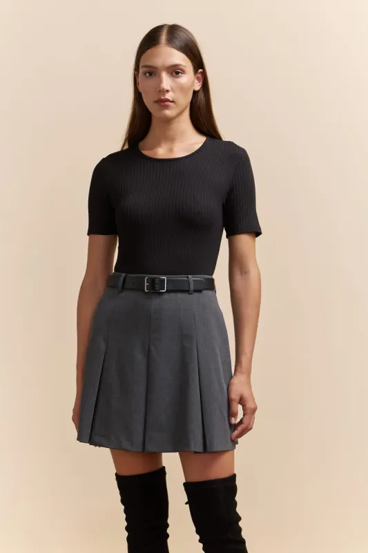 Pleated skirt sold by Tristan Style