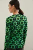 Floral printed micro mesh top sold by Tristan Style