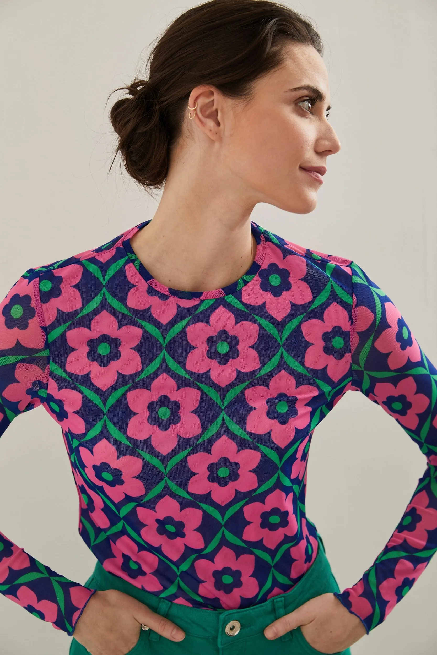 Floral printed micro mesh top sold by Tristan Style