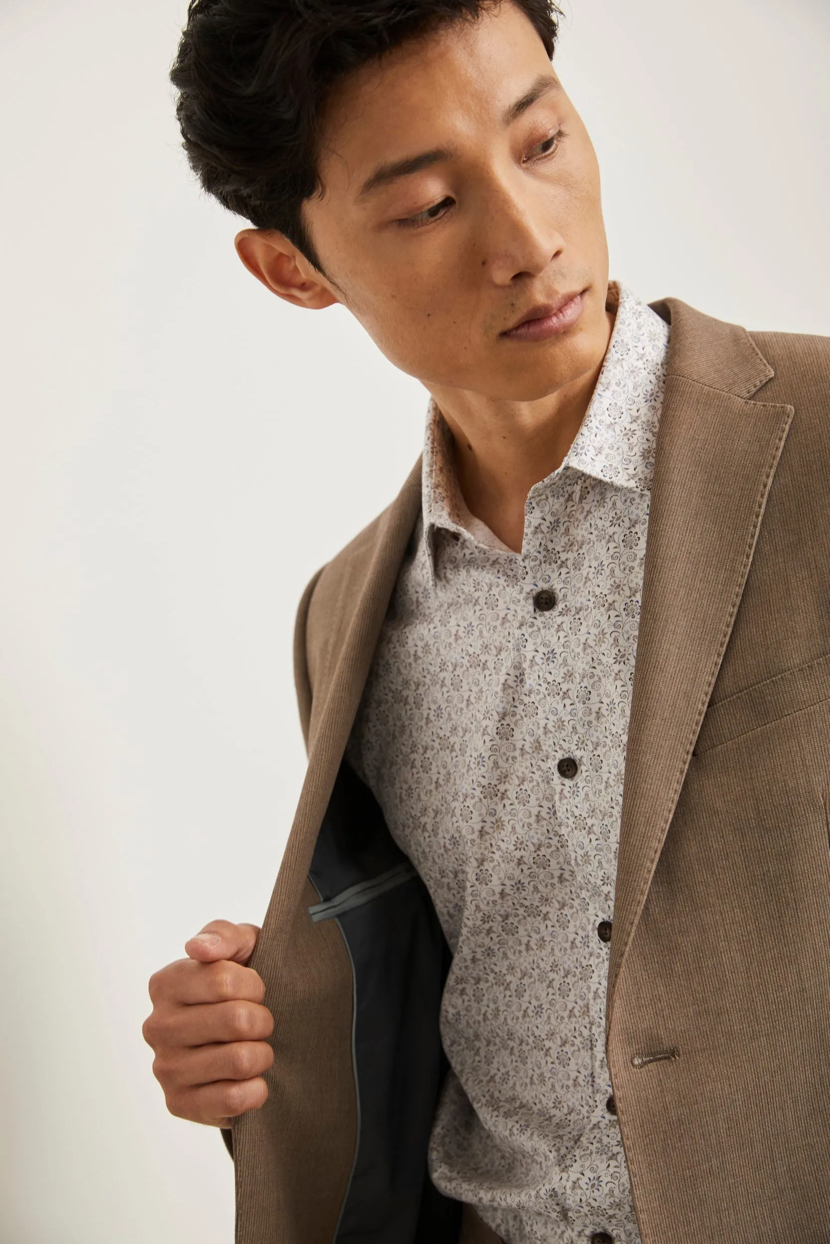 Extra-fitted textured blazer sold by Tristan Style