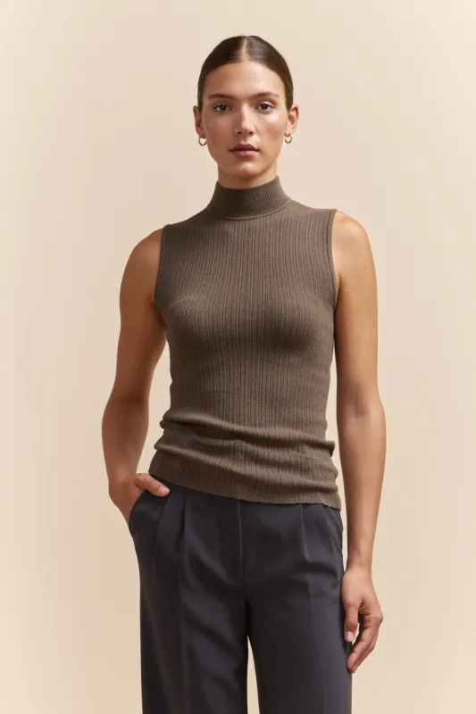 Sleeveless sweater with mock neck sold by Tristan Style