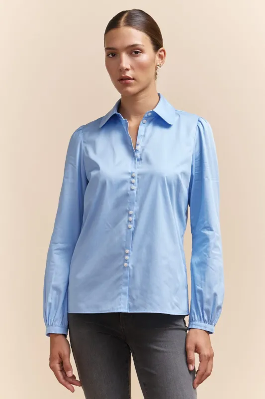 Puffy sleeve blouse with button detail sold by Tristan Style