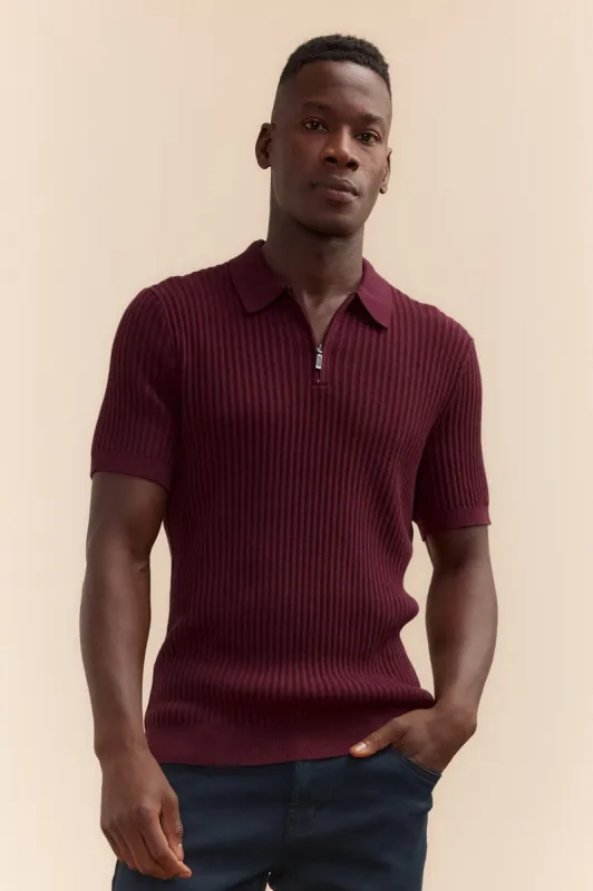Rib-knit zip polo shirt sold by Tristan Style