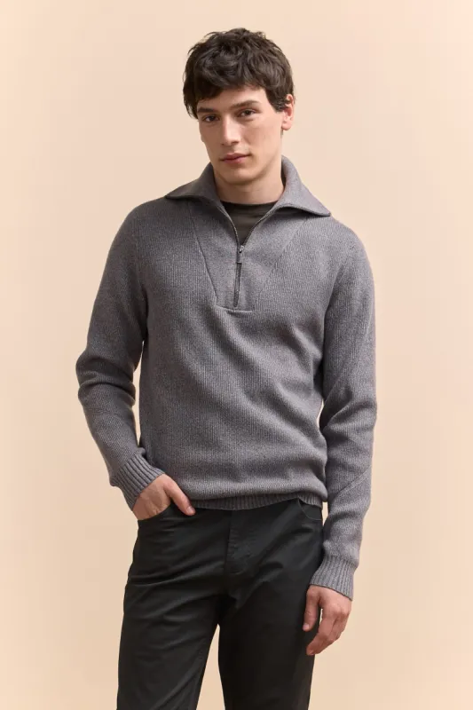 Mock-zip sweater sold by Tristan Style