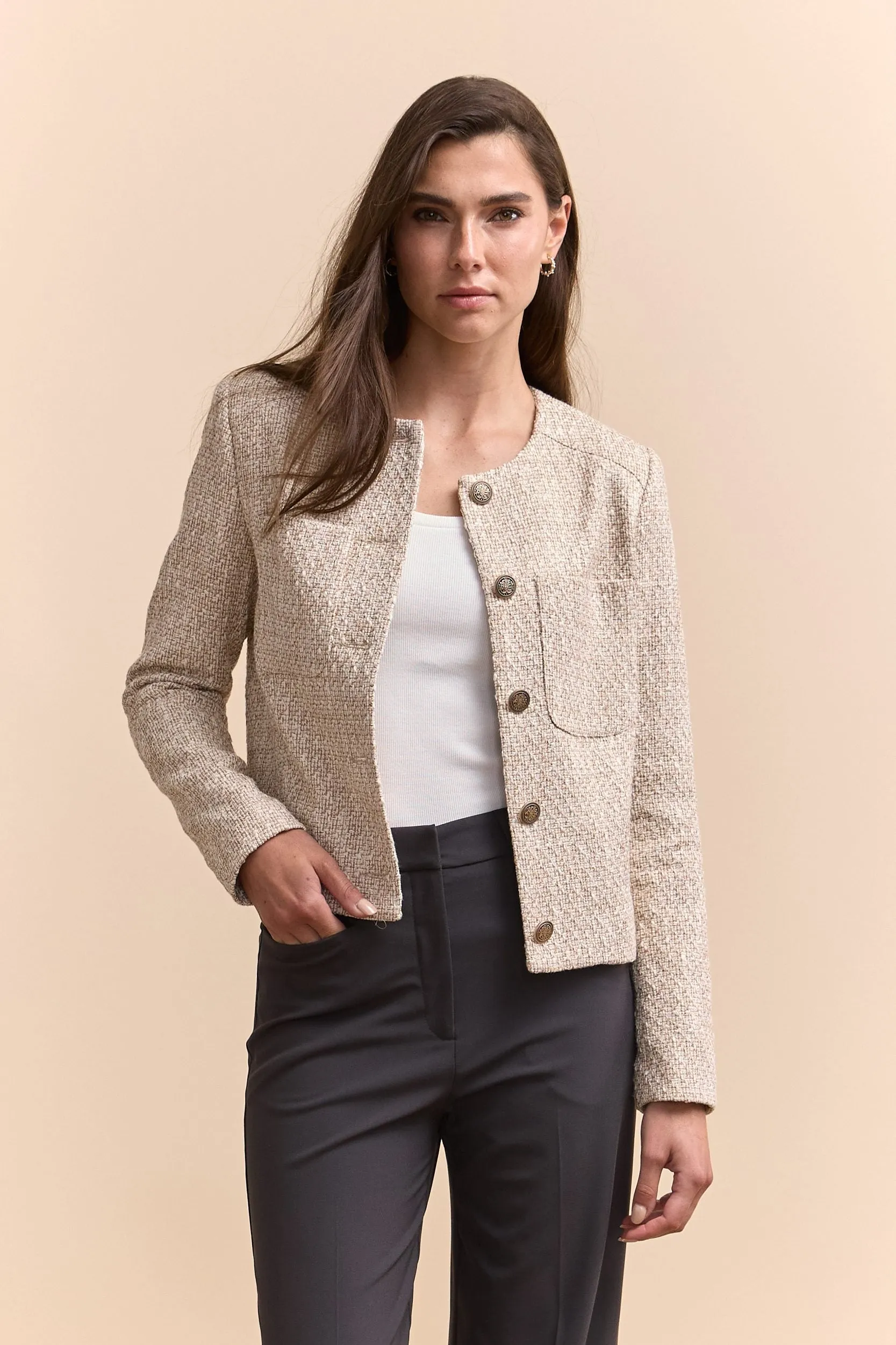 Tweed jacket with applied pockets sold by Tristan Style