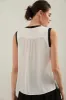 Sleeveless top with contrast detail sold by Tristan Style