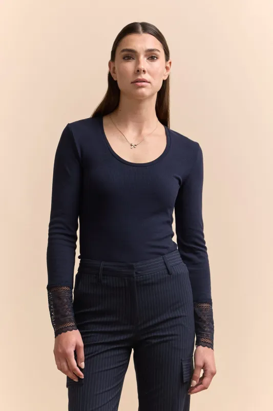 Jersey top with lace sleeve sold by Tristan Style