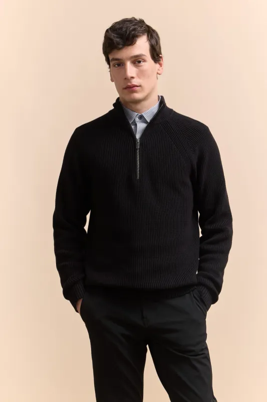 Mock-zip sweater sold by Tristan Style