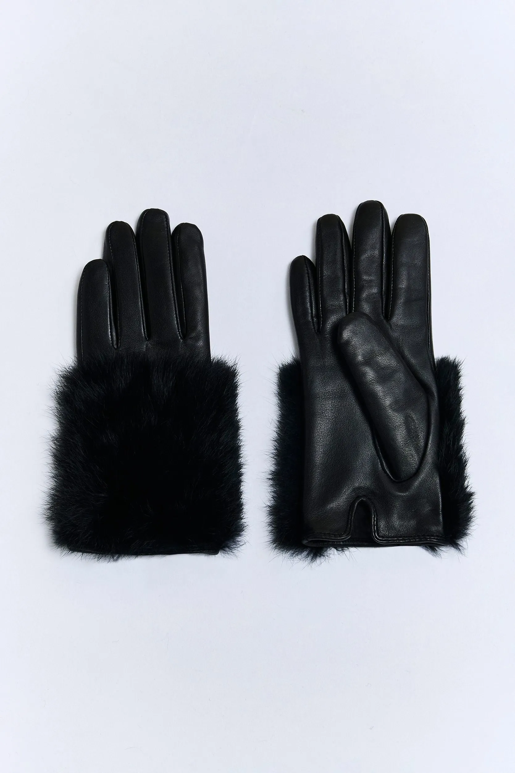 Leather gloves with fur sold by Tristan Style