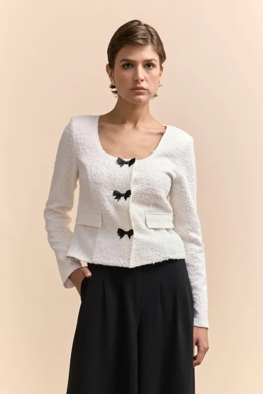 Stretch jacket with ribbon sold by Tristan Style
