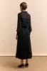 Pleated mesh and satin skirt sold by Tristan Style