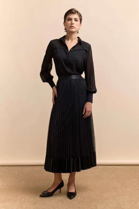 Pleated mesh and satin skirt sold by Tristan Style