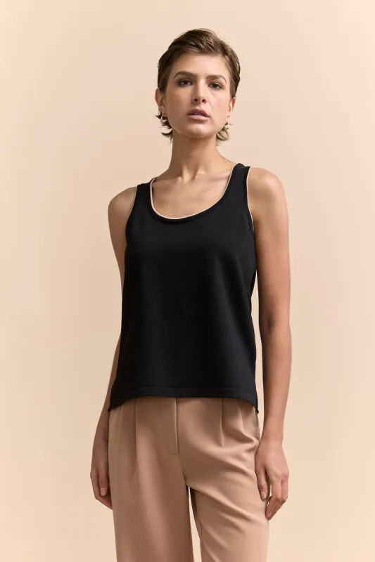 Sleeveless top with sheer back sold by Tristan Style