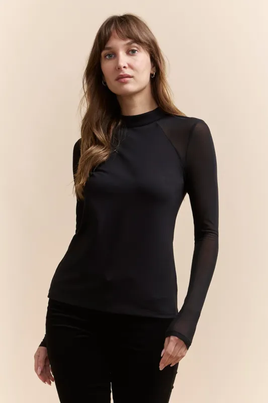 Mixed fabrics mock neck top sold by Tristan Style