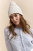 Tuque with pompom sold by Tristan Style