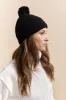 Tuque with pompom sold by Tristan Style