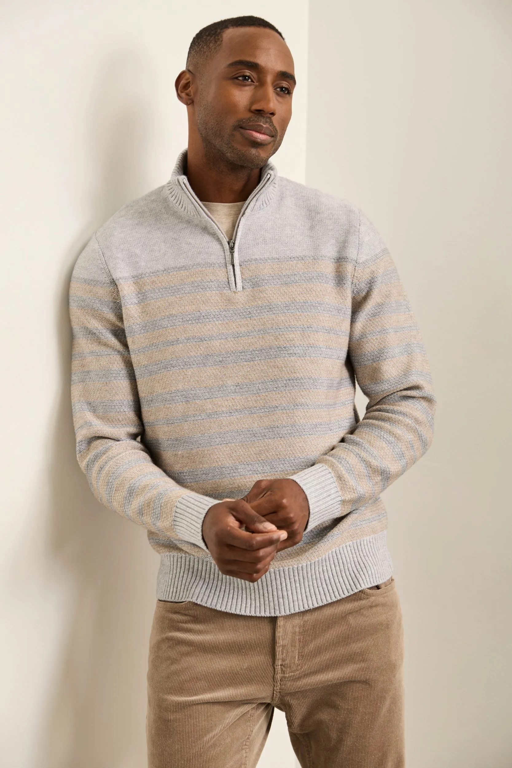 Striped mock neck sweater sold by Tristan Style