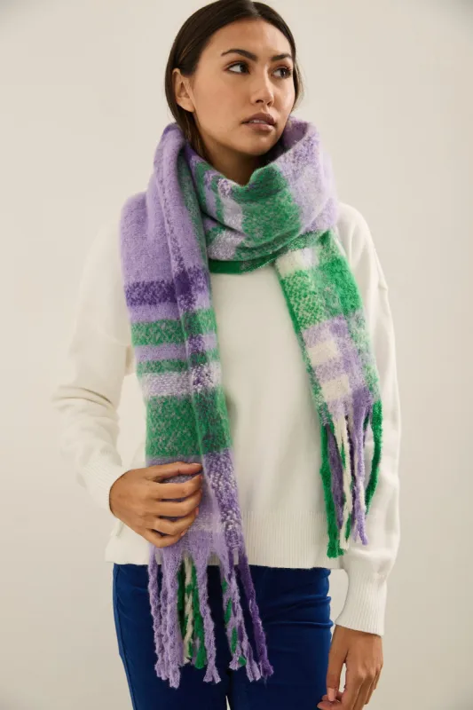 Plaid scarf with fringe sold by Tristan Style